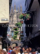 UK, Kent, CANTERBURY, crowds in narrow street and Cathedral in background, CTB228JPL