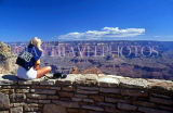 USA, Arizona, GRAND CANYON, South Rim, tourist sitting on wall, GC61JPL