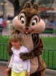 USA, California, LOS ANGELES, Anaheim, Disneyland, Chip character posing with child, US3932JPL