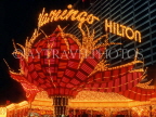 USA, Nevada, LAS VEGAS, The Strip, neon lit Hilton Hotel front, LV114JPL