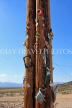 USA, Nevada, Rhyolite Ghost Town, telegraph pole, momentos attached by visitors, US4796JPL