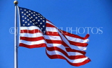 USA, New York, MANHATTAN, US flag gainst blue sky, US122JPL