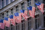 USA, New York, MANHATTAN, US flags hanging from 5th Avenue shop, NYC338JPL