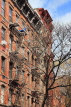 USA, New York, MANHATTAN, wrought iron fire escapes in apartment buildings, US4653JPL
