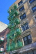 USA, New York, MANHATTAN, wrought iron fire escapes in apartment buildings, US4654JPL