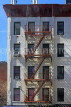 USA, New York, MANHATTAN, wrought iron fire escapes in apartment buildings, US4655JPL