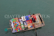VIETNAM, Halong Bay, boat vendor with snacks for selling to cruise boat tourists, VT1880JPL
