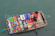 VIETNAM, Halong Bay, boat vendor with snacks for selling to cruise boat tourists, VT1881JPL