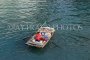 VIETNAM, Halong Bay, boat vendor with snacks for selling to cruise boat tourists, VT1888JPL