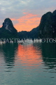 VIETNAM, Halong Bay, dawn, limestone formations and moored cruise boats, VT1808JPL