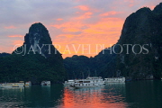 VIETNAM, Halong Bay, dawn, limestone formations and moored cruise boats, VT1810JPL