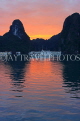 VIETNAM, Halong Bay, dawn, limestone formations and moored cruise boats, VT1812JPL
