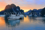 VIETNAM, Halong Bay, dawn, limestone formations and moored cruise boats, VT1825JPL
