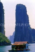 VIETNAM, Halong Bay, limestone formations and floating home, VT489JPL