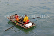 VIETNAM, Halong Bay, small boat with woman and child, VT1905JPL
