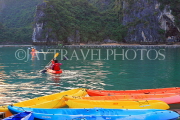 VIETNAM, Halong Bay, tourists kayaking, VT1959JPL