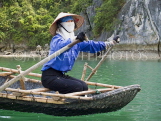 VIETNAM, Halong Bay, woman rowing, VT529JPL