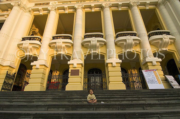 VIETNAM, Hanoi, Opera House, and boy seated on steps, VT568JPL