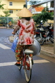 VIETNAM, Hanoi, cyclist wearing conical hat, VT667JPL