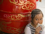 VIETNAM, Hanoi, girl eating snack, VT559JPL