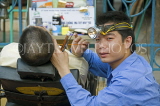 VIETNAM, Hanoi, hairdresser cleaning ears, VT560JPL