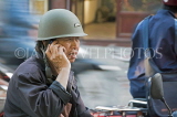 VIETNAM, Hanoi, man on bike, talking on phone, VT561JPL