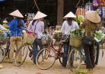 VIETNAM, Hanoi, market scene, vendor with bicycles, VT564JPL