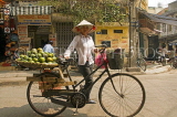 VIETNAM, Hanoi, ornage vendor with bicycle, VT571JPL