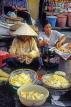 VIETNAM, Hanoi, street vendors, woman peeling vegetables, VT277JPL