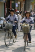 VIETNAM, Hanoi, students on bicycles, VT589JPL