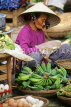 VIETNAM, Hoi An, Central Market, banana stall and vendor, VT693JPL