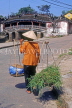 VIETNAM, Hoi An, vendor with baskets and Japanese Bridge, VT671JPL