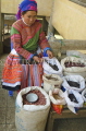 VIETNAM, Lao Cai province, Sapa, Flower Hmong women selling beans in market, VT619JPL