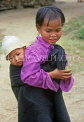 VIETNAM, Nha Trang, girl carrying little brother on back, VT477JPL