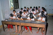 VIETNAM, Nha Trang, school children in classroom, writing on slate, VT476JPL