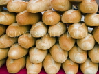 VIETNAM, Saigon (Ho Chi Ming City), French baguettes stacked up in market, VT528JPL