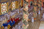 VIETNAM, Tay Ninh, Cao Dai Holy See temple, monks at prayer, VT380JPL