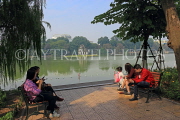 Vietnam, HANOI, Hoan Kiem Lake, people seated along lakeside promenade, VT1536JPL