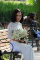 Vietnam, HANOI, Hoan Kiem Lake, promenade,  girl with flower bouquet posing, VT1197JPL