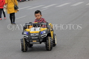 Vietnam, HANOI, Hoan Kiem Lake area, weekend pedestrianised area, child driving toy car, VT1703JPL