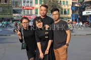 Vietnam, HANOI, Hoan Kiem Lake area, young people posing for photo, VT1720JPL