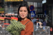 Vietnam, HANOI, Hoan Kiem Lake area, young woman posing for photo, VT1715JPL