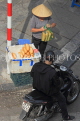 Vietnam, HANOI, Old Quarter, Street Vendor, and customer, VT1521JPL