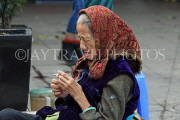 Vietnam, HANOI, Old Quarter, old woman with cigarette, VT1766JPL