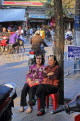 Vietnam, HANOI, Old Quarter, two women seated on stools, VT1205JPL