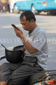 Vietnam, HANOI, man checking his phone, VT1199JPL