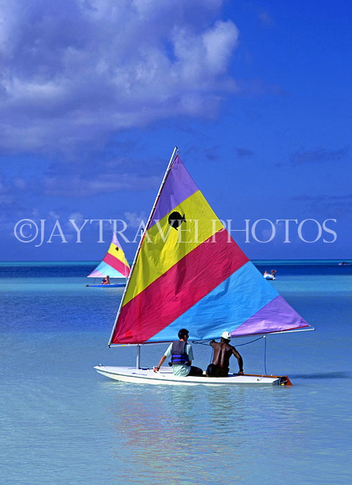 ANTIGUA, West Coast, tourist having lesson in sailboat, ANT673JPL