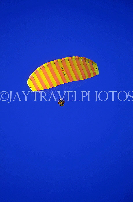 AUSTRIA, Tyrol, Zillertal Alps, Paraglider against blue sky, AST553JPL