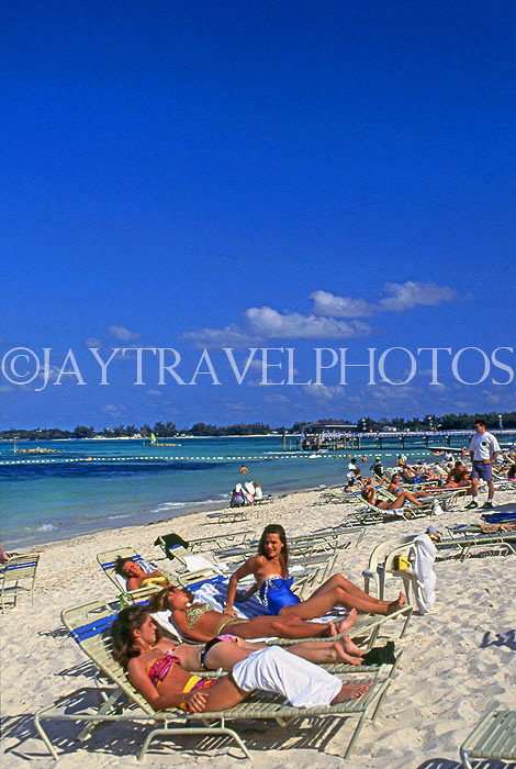 BAHAMAS, New Providence Island, Cable Beach, sunbathers, BAH237JPL
