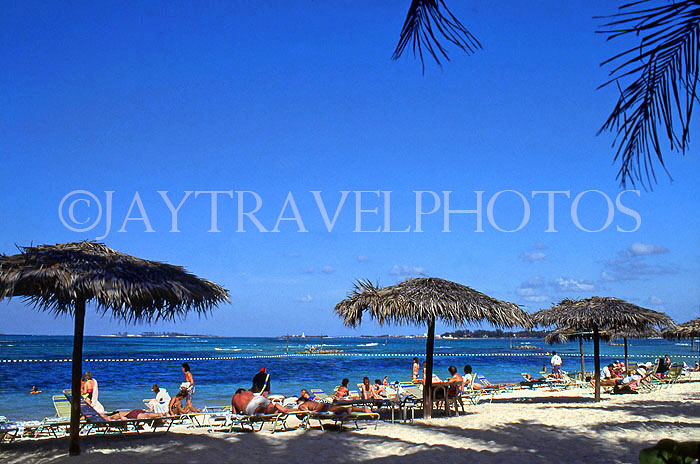 BAHAMAS, New Providence Island, Cable Beach and sunbathers, BAH235JPL
